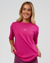 Woman wearing Go-To Script FLXCotton Oversized Tee - Ultra Pink-White | Model:Issy | Size:XS | Thumbnail Index: 6