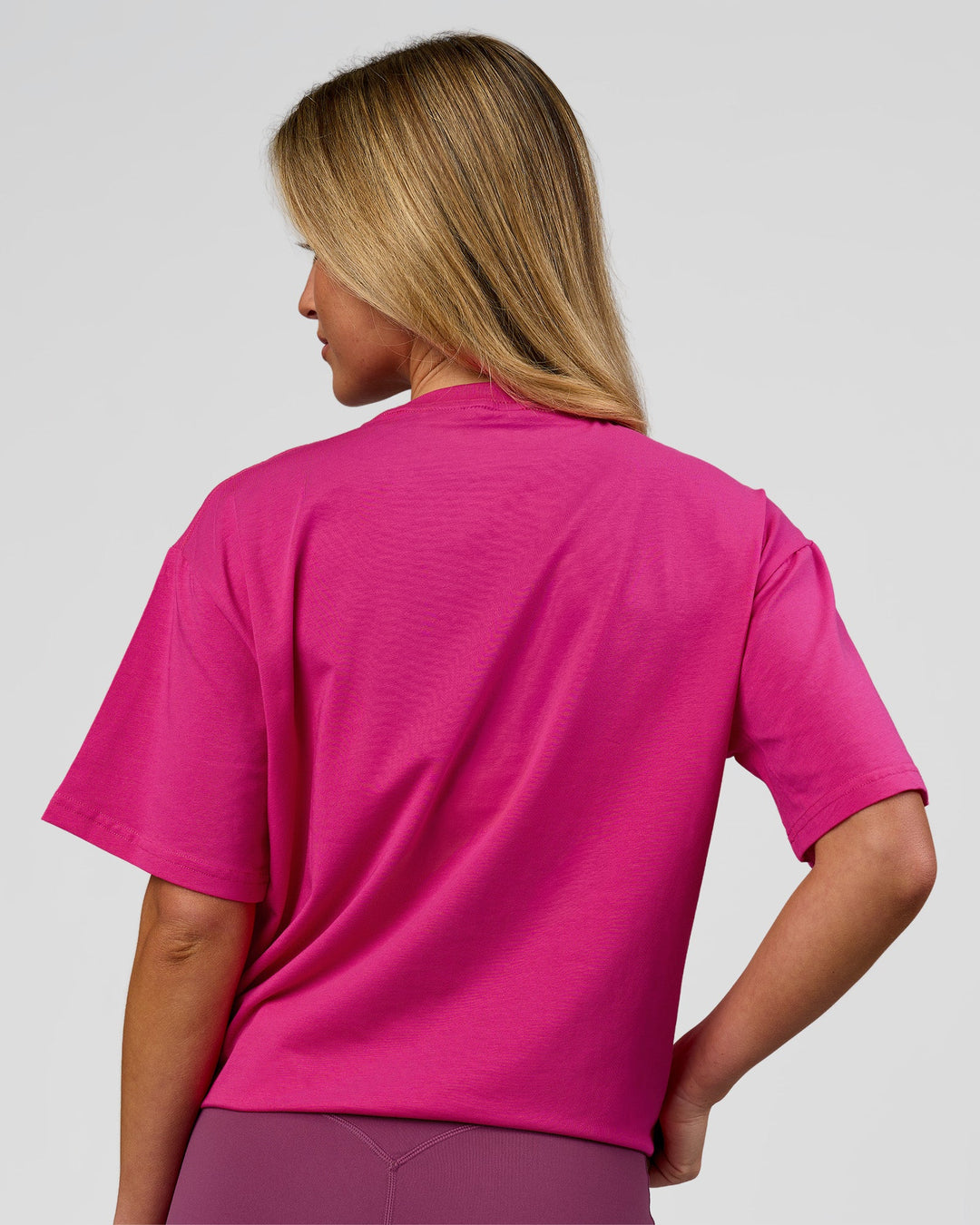 Woman wearing Go-To Script FLXCotton Oversized Tee - Ultra Pink-White | Model:Issy | Size:XS - view 8