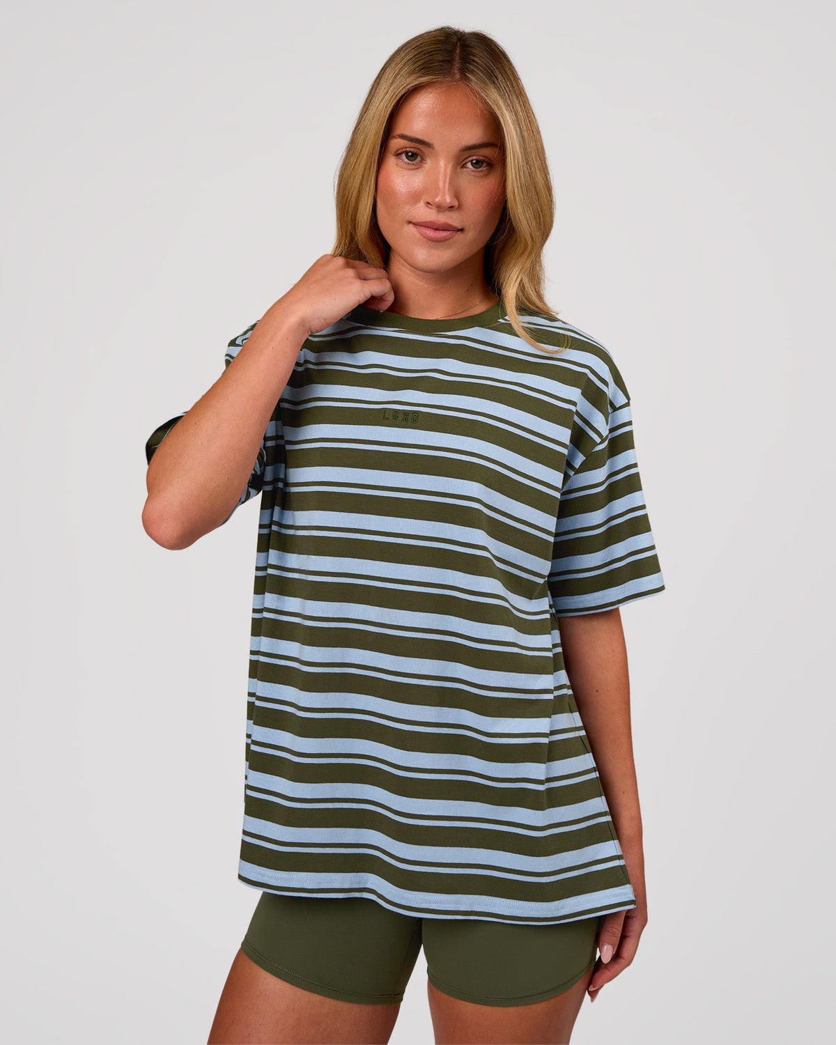 Woman wearing Go-To Shadow Stripe FLXCotton Oversized Tee - Pure Olive-Open Air | Model:Issy | Size:XS - view 1