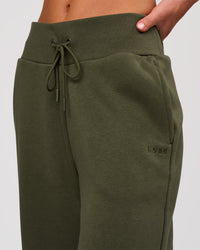 Woman wearing Go-To Wide Leg Track Pant - Pure Olive | Model:Issy | Size:XS | Thumbnail Index: 3