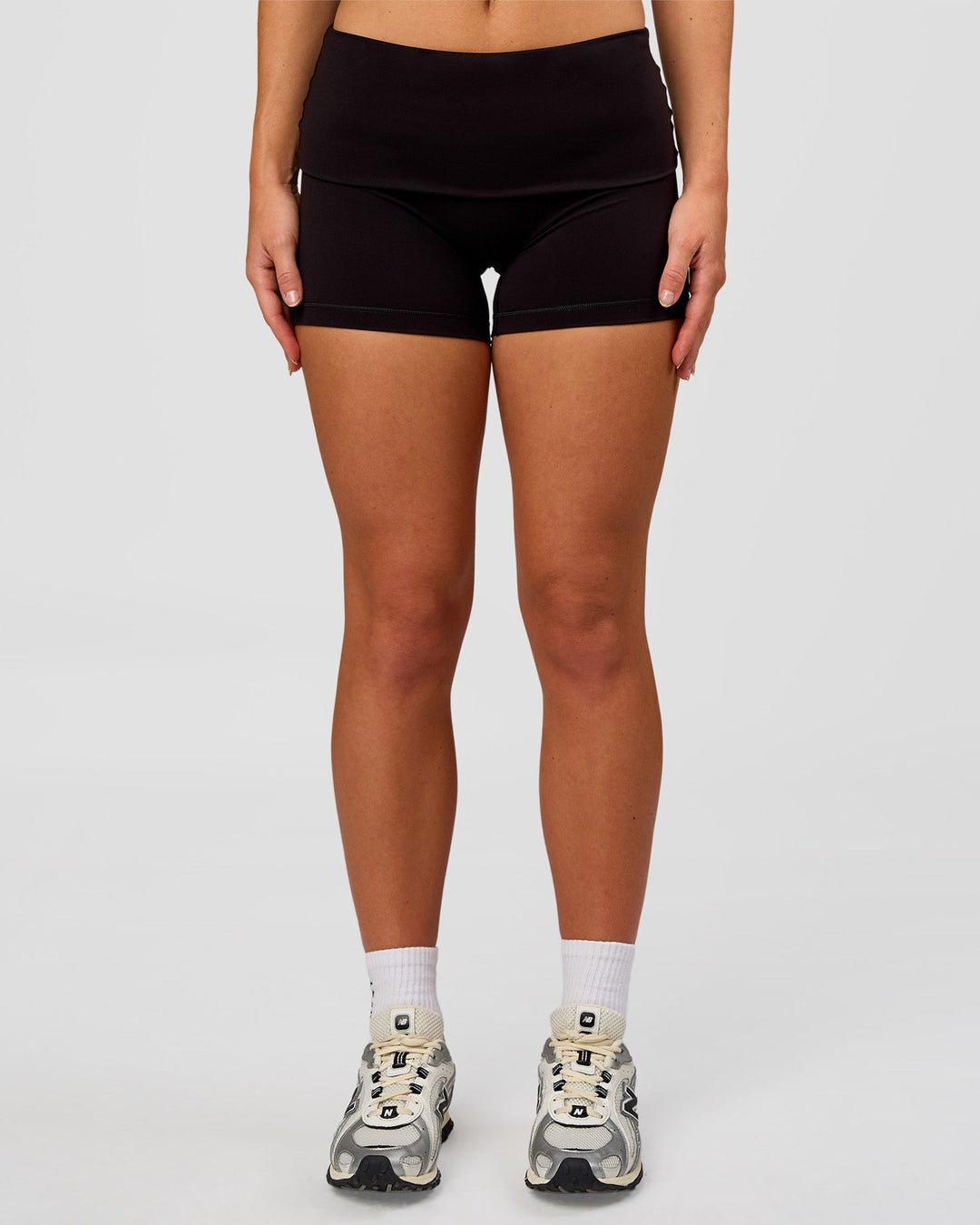 Woman wearing Groovy High Rise Fold Over 4" Short - Black | Model:Issy | Size:XS - view 3
