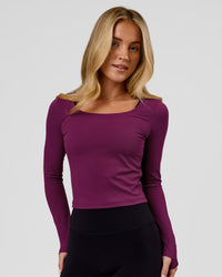 Woman wearing Horizon Long Sleeve Tee - Plum Caspia | Model:Issy | Size:XS | Thumbnail Index: 2