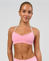 Woman wearing Infinity Sports Bra - Pink Rose | Model:Issy | Size:XS