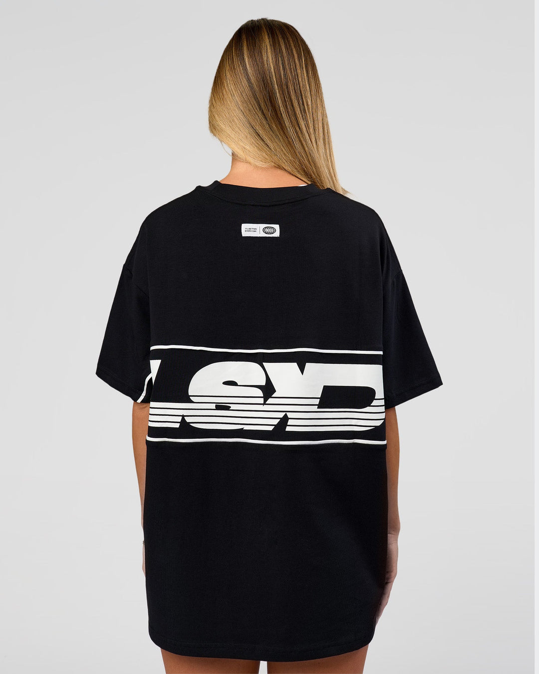 Woman wearing Inline Heavyweight FLXCotton Oversized Tee - Black-White | Model:Issy | Size:XS - view 7