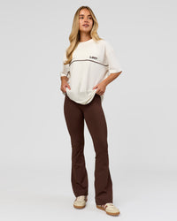 Woman wearing Inline Heavyweight FLXCotton Oversized Tee - Off White-Hot Chocolate | Model:Issy | Size:XS | Thumbnail Index: 11