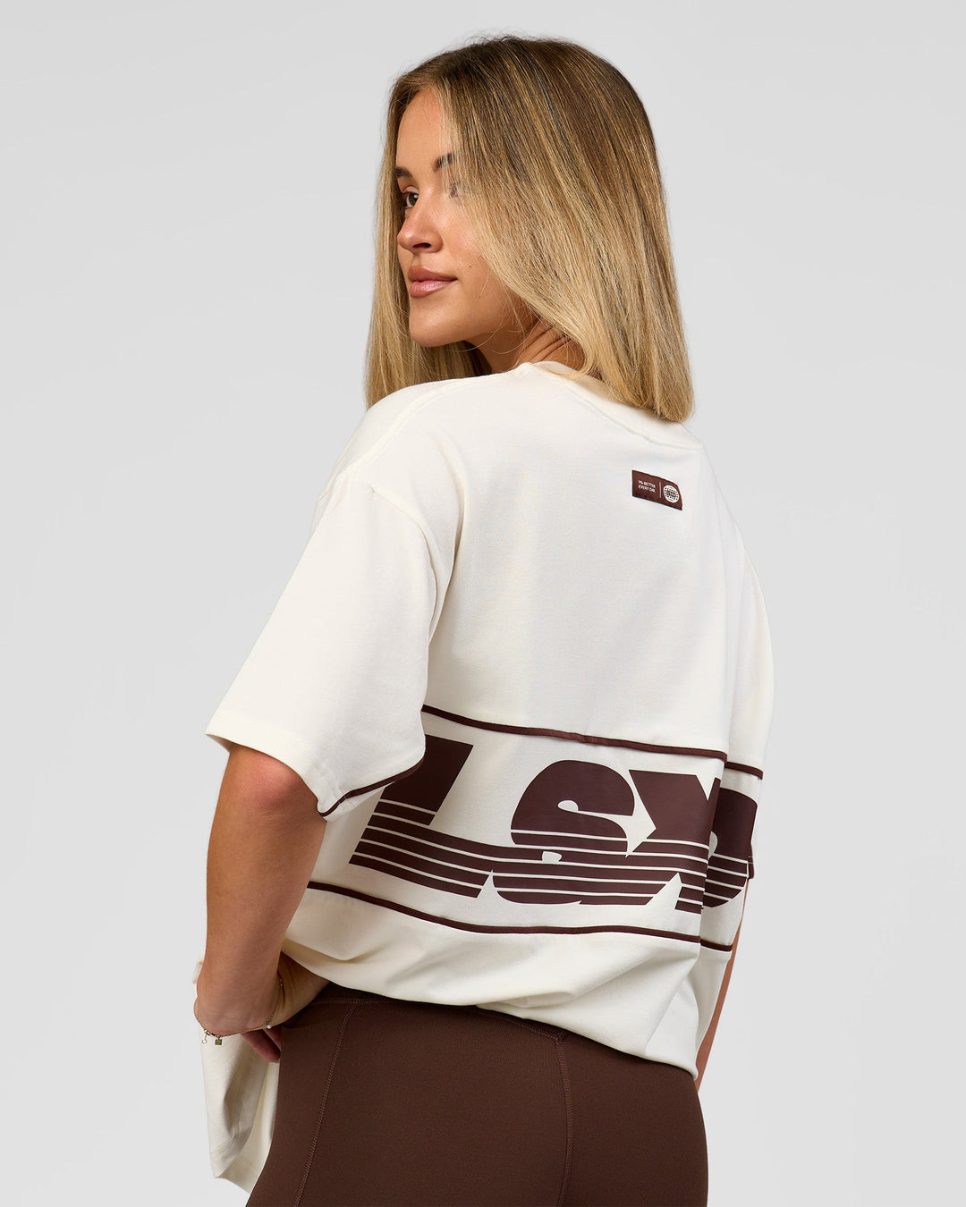 Woman wearing Inline Heavyweight FLXCotton Oversized Tee - Off White-Hot Chocolate | Model:Issy | Size:XS - view 15