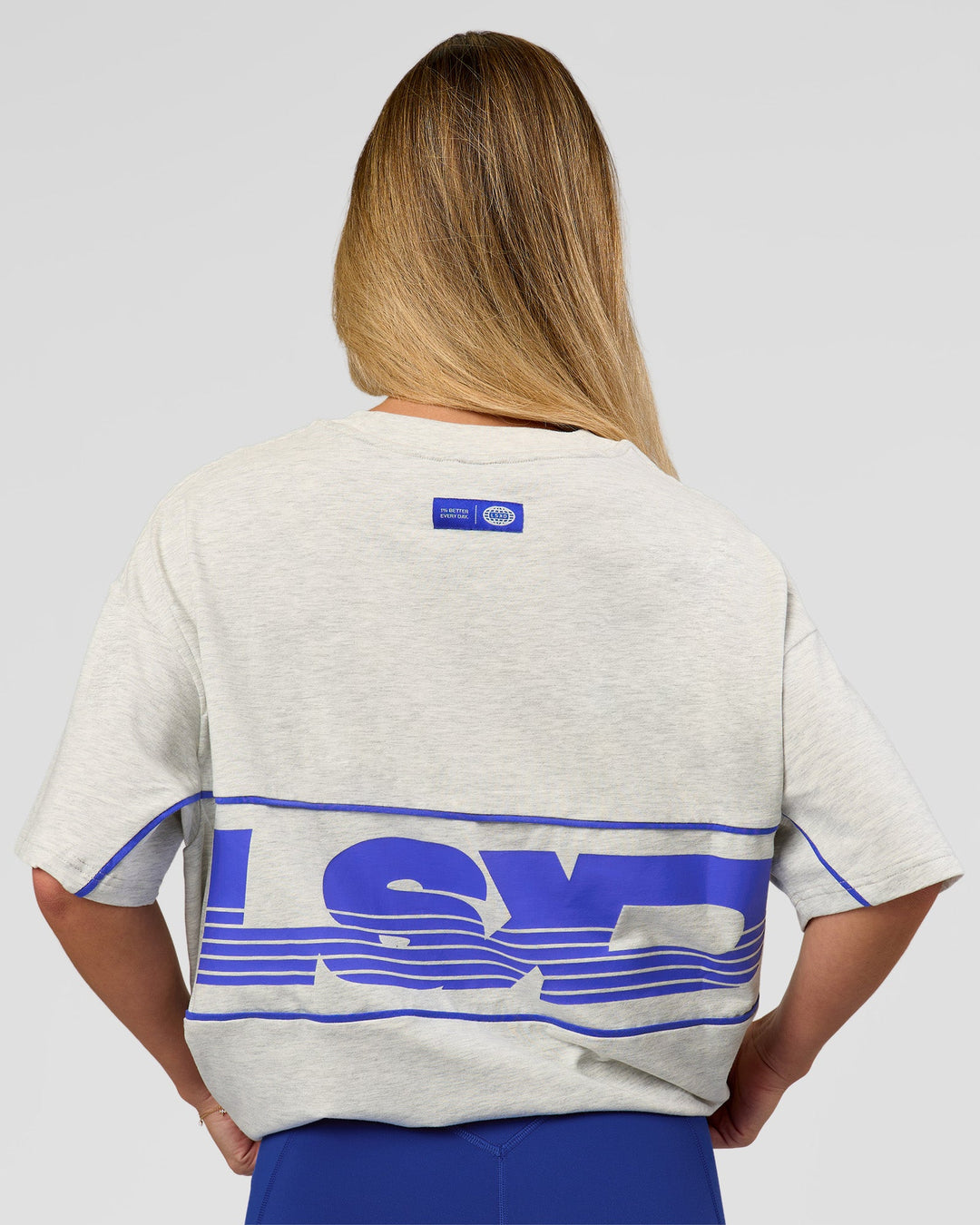 Woman wearing Inline Heavyweight FLXCotton Oversized Tee - Silver Marl-Power Cobalt | Model:Issy | Size:XS - view 10