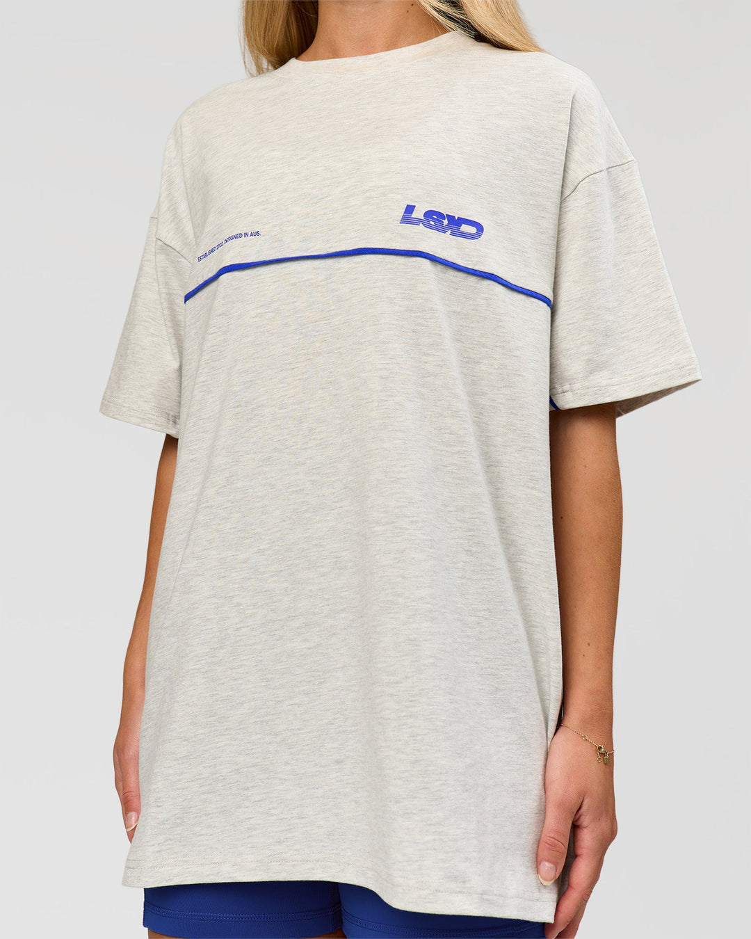 Woman wearing Inline Heavyweight FLXCotton Oversized Tee - Silver Marl-Power Cobalt | Model:Issy | Size:XS - view 11