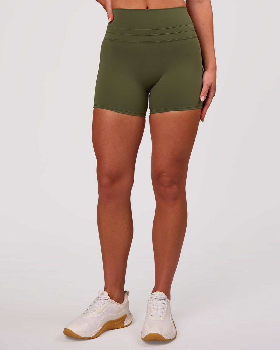 Woman wearing Luxe V-Contour High-Rise 4" Short - Pure Olive | Model:Issy | Size:XS - view 3