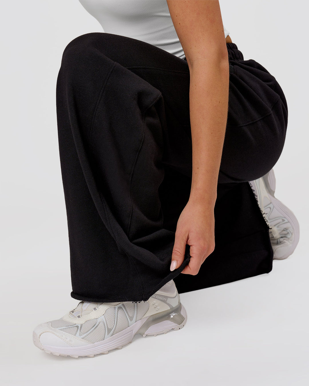 Woman wearing MVP Elite Terry Wide Leg Pant - Black-White | Model:Issy | Size:XS - view 6