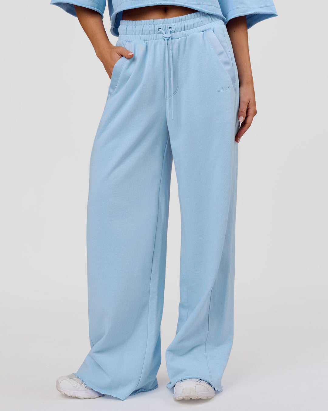 Woman wearing MVP Elite Terry Wide Leg Pant - Open Air | Model:Issy | Size:XS - view 1