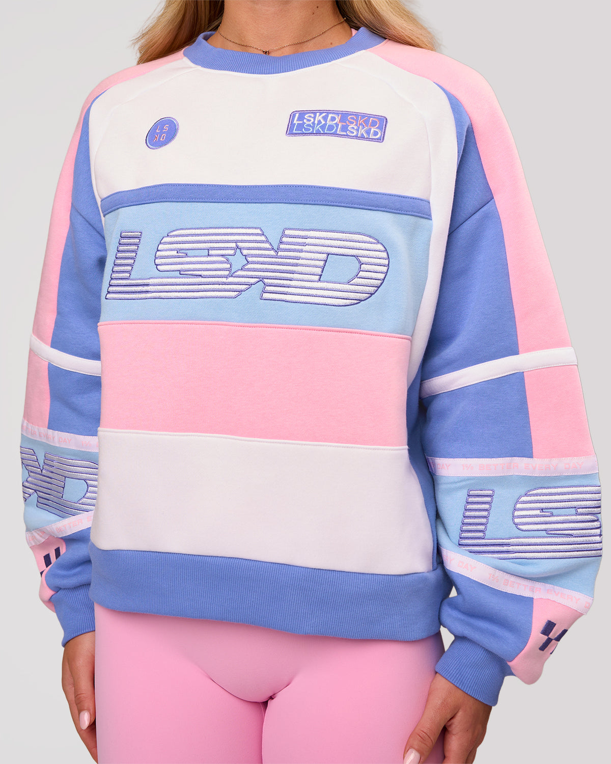 Woman wearing Power Sweater - Pink Rose-Bluebell | Model:Issy | Size:XS