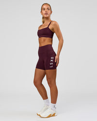 Woman wearing Rep Ultra High-Rise 4" Short Pockets - Cherry Lacquer-White | Model:Issy | Size:XS | Thumbnail Index: 2