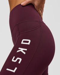 Woman wearing Rep Ultra High-Rise 6" Short Pockets - Cherry Lacquer-White | Model:Issy | Size:XS | Thumbnail Index: 3