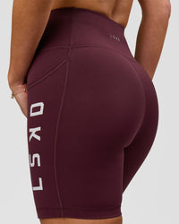 Woman wearing Rep Ultra High-Rise 6" Short Pockets - Cherry Lacquer-White | Model:Issy | Size:XS | Thumbnail Index: 5