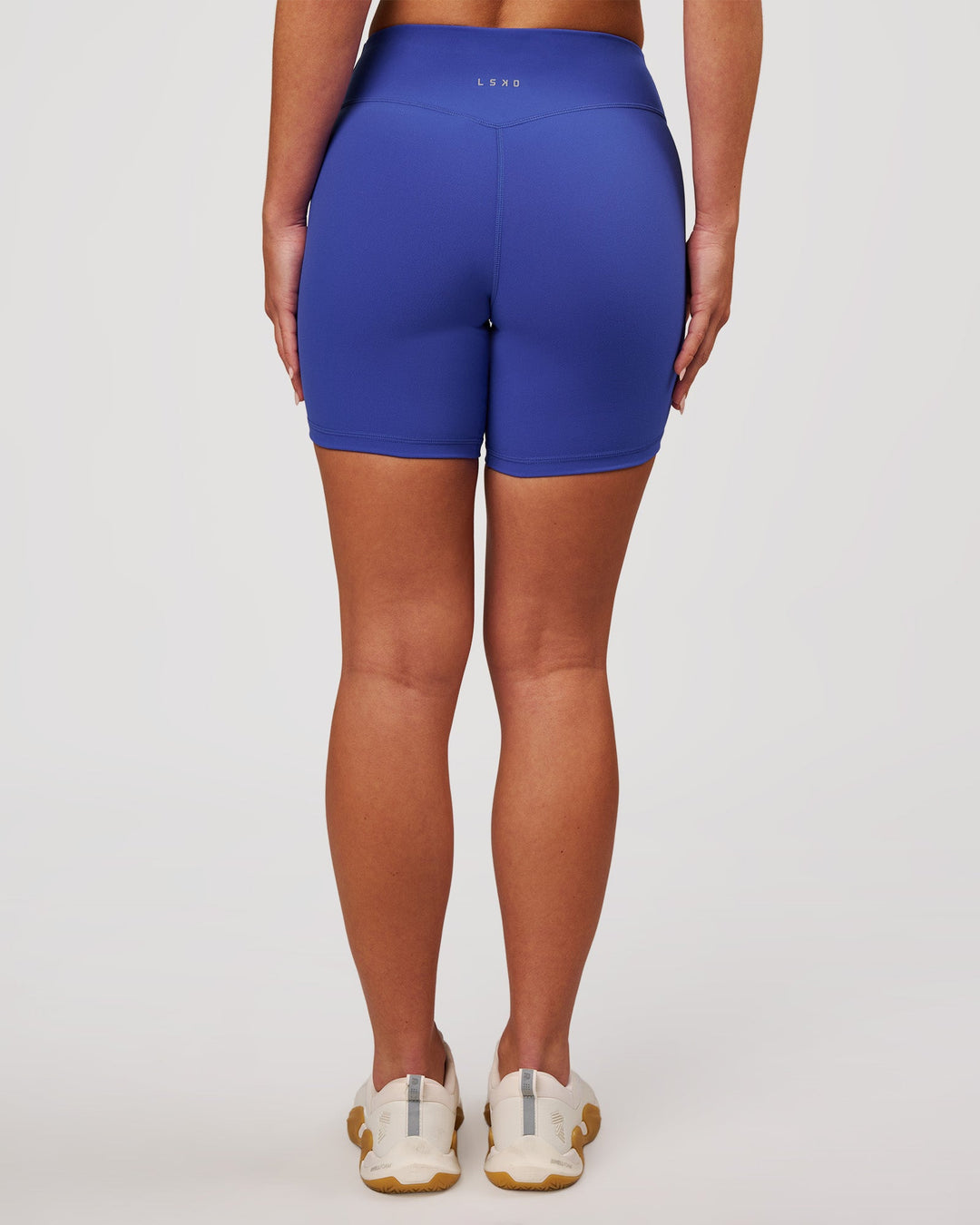 Woman wearing RXD Mid-Rise 6" Short - Power Cobalt | Model:Issy | Size:XS - view 3