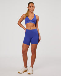 Woman wearing RXD Mid-Rise 6" Short - Power Cobalt | Model:Issy | Size:XS | Thumbnail Index: 5