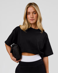 Woman wearing Shadow Mark Heavyweight Oversized Tee - Black-Onyx | Model:Issy | Size:XS | Thumbnail Index: 5