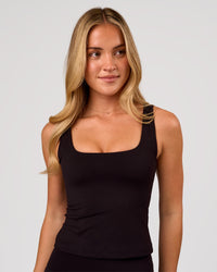 Woman wearing Staple 2.0 Active Shelf Bra Tank - Black | Model:Issy | Size:XS | Thumbnail Index: 0