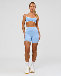 Woman wearing Strong is Beautiful Fusion High-Rise 6" Short - Open Air | Model:Issy | Size:XS | Thumbnail Index: 3