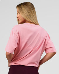 Woman wearing VS1 Enjoy The Journey FLXCotton Oversize Tee - Pink Rose | Model:Issy | Size:XS | Thumbnail Index: 6