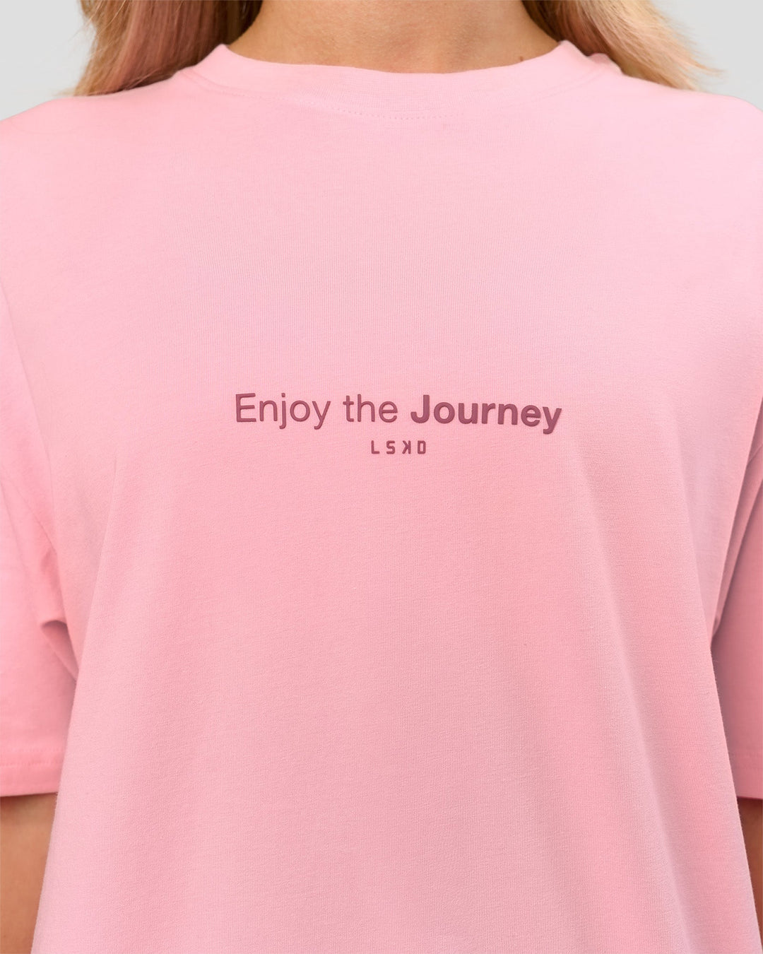 Woman wearing VS1 Enjoy The Journey FLXCotton Oversize Tee - Pink Rose | Model:Issy | Size:XS - view 14
