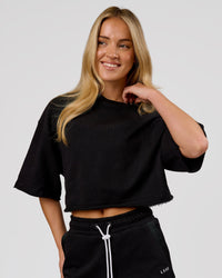 Woman wearing Go-To Terry Oversized Tee - Black | Model:Issy | Size:XS | Thumbnail Index: 0
