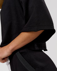 Woman wearing Go-To Terry Oversized Tee - Black | Model:Issy | Size:XS | Thumbnail Index: 4
