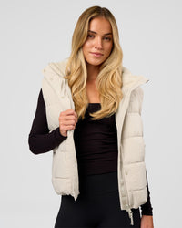Woman wearing Go-To Puffer Vest - Shale Beige | Model:Izzy | Size:XS | Thumbnail Index: 5