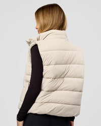 Woman wearing Go-To Puffer Vest - Shale Beige | Model:Izzy | Size:XS | Thumbnail Index: 7