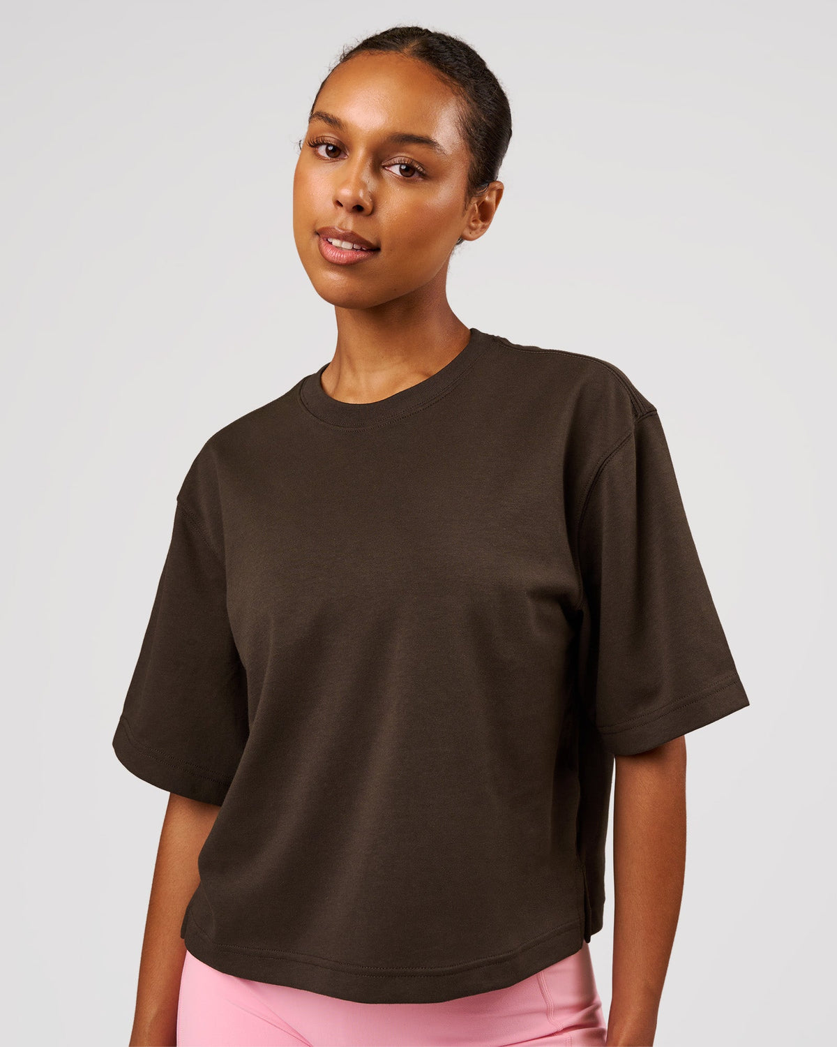 Woman wearing AfterDark ZeroCrease Cropped Tee - Ground Coffee | Model:Jordan | Size:XS