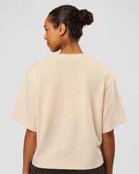 Woman wearing AfterDark ZeroCrease Cropped Tee - Vanilla Bean | Model:Jordan | Size:XS | Thumbnail Index: 2