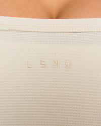 Woman wearing CloudWaffle Square Neck Tank - Vanilla Bean | Model:Jordan | Size:XS | Thumbnail Index: 4