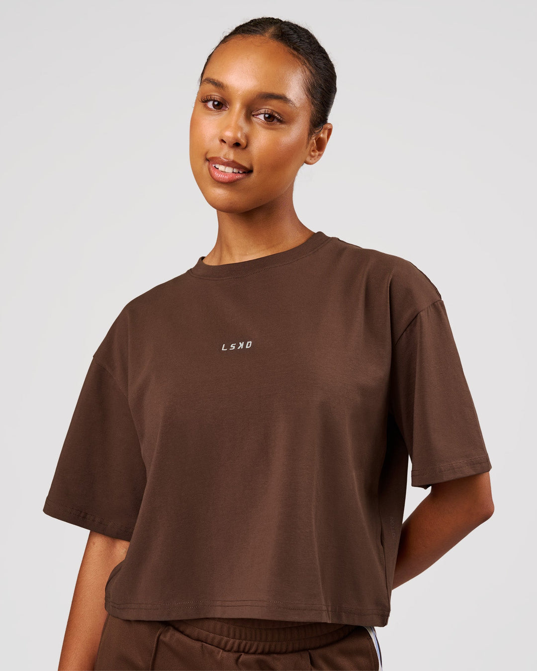 Woman wearing Go-To Heavyweight FlxCotton Skimmer Tee - Hot Chocolate-White | Model:Jordan | Size:XS - view 1