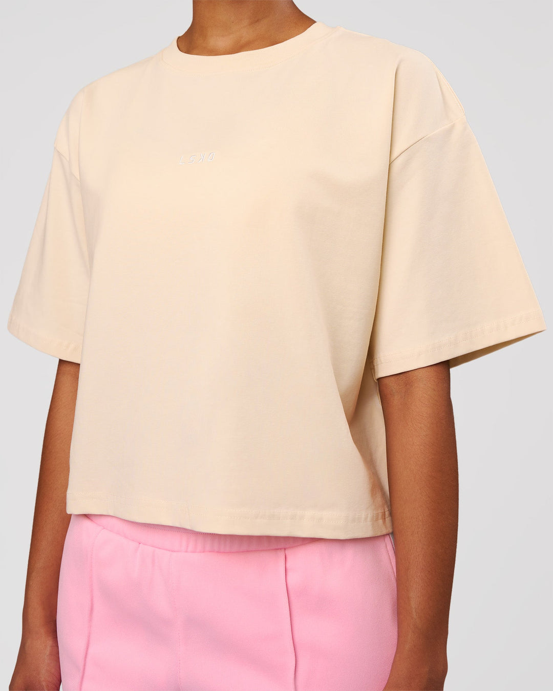 Woman wearing Go-To Heavyweight FlxCotton Skimmer Tee - Vanilla Bean-White | Model:Jordan | Size:XS - view 3
