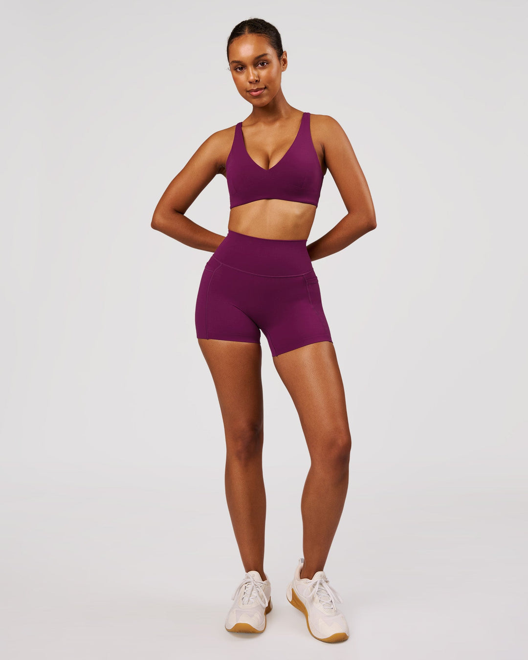 Woman wearing Vitality Sports Bra - Plum Caspia | Model:Jordan | Size:XS - view 6