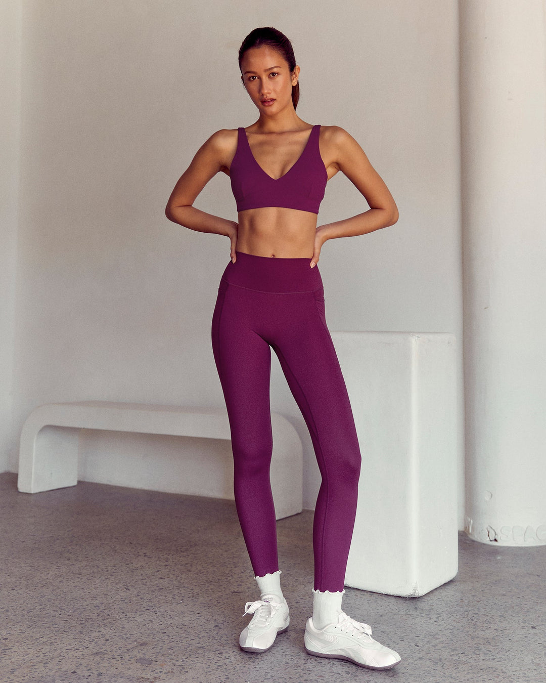 Woman wearing Vitality Sports Bra - Plum Caspia | Model:Kenni | Size:XS - view 5