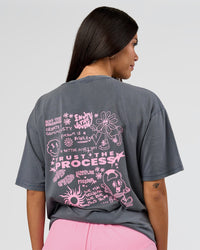 Woman wearing Built On Values FLXCotton Oversized Tee - Dark Storm Washed-Pink Rose | Model:Rhiley | Size:XS