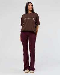 Woman wearing Inline Heavyweight FLXCotton Oversized Tee - Hot Chocolate-Off White | Model:Rhiley | Size:XS | Thumbnail Index: 12