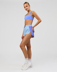 Woman wearing Accelerate 3" High-Rise Running Short - Bluebell-Open Air | Model:Taneisha | Size:XS | Thumbnail Index: 4