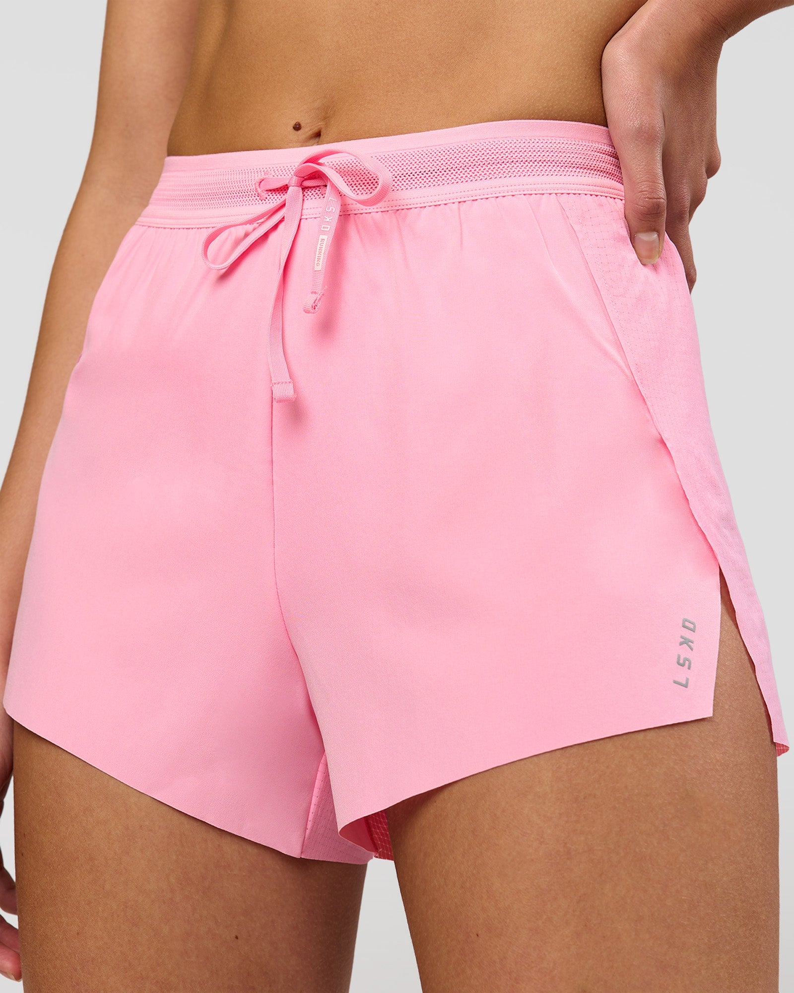 Woman wearing Accelerate 3" High-Rise Running Short - Pink Rose | Model:Taneisha | Size:XS