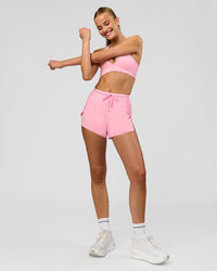 Woman wearing Accelerate 3" High-Rise Running Short - Pink Rose | Model:Taneisha | Size:XS | Thumbnail Index: 2