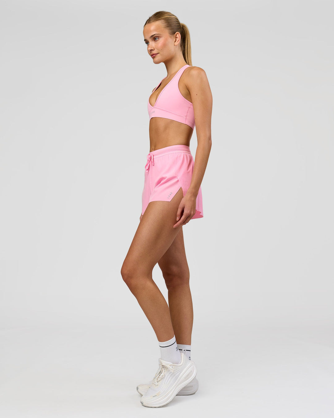 Woman wearing Accelerate 3" High-Rise Running Short - Pink Rose | Model:Taneisha | Size:XS - view 8