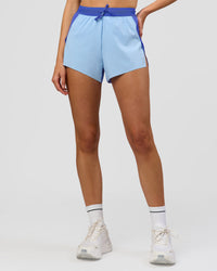 Woman wearing Accelerate 3" High-Rise Running Short - Power Cobalt-Open Air | Model:Taneisha | Size:XS | Thumbnail Index: 5