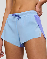 Woman wearing Accelerate 3" Mid-Rise Running Short - Bluebell-Open Air | Model:Taneisha | Size:XS | Thumbnail Index: 2