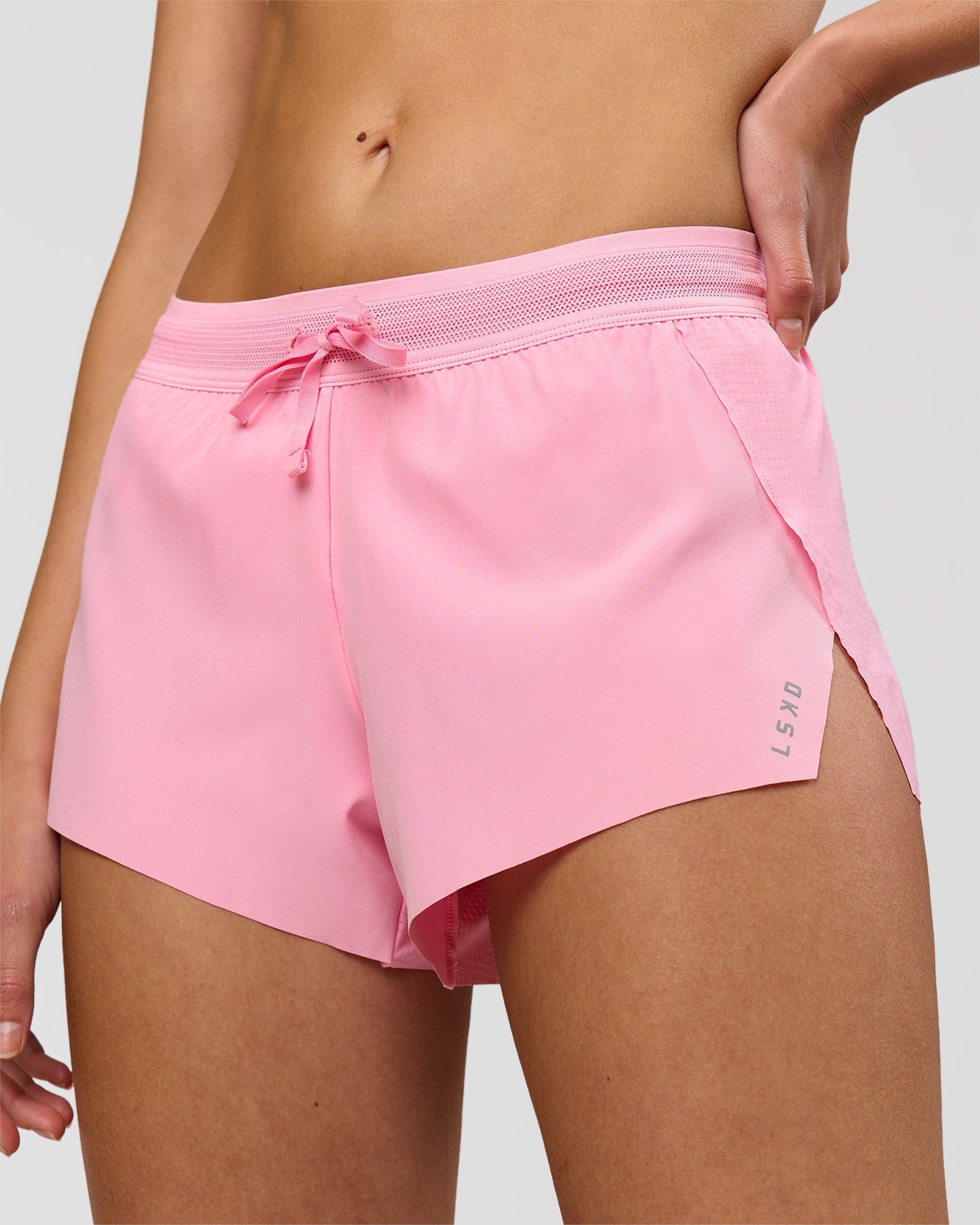 Woman wearing Accelerate 3" Mid-Rise Running Short - Pink Rose | Model:Taneisha | Size:XS