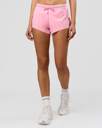 Woman wearing Accelerate 3" Mid-Rise Running Short - Pink Rose | Model:Taneisha | Size:XS
