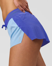 Woman wearing Accelerate 3" Mid-Rise Running Short - Power Cobalt-Open Air | Model:Taneisha | Size:XS | Thumbnail Index: 1