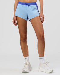 Woman wearing Accelerate 3" Mid-Rise Running Short - Power Cobalt-Open Air | Model:Taneisha | Size:XS | Thumbnail Index: 6