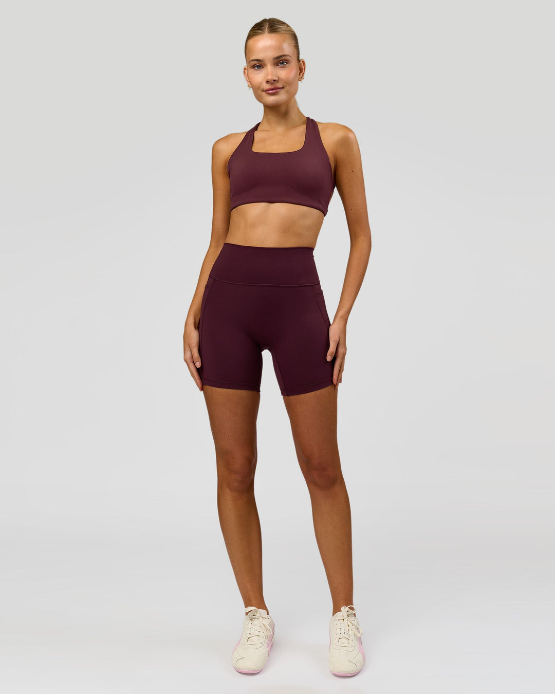 Woman wearing Aspire Sports Bra - Cherry Lacquer | Model:Taneisha | Size:XS - view 4